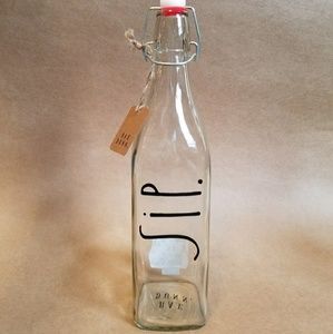 Rae Dunn SIP swing top glass bottle